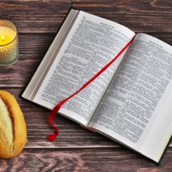 bible with bread & candle